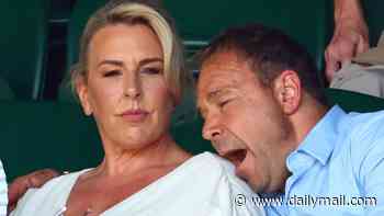 Sleepy Stephen Graham yawns on wife Hannah Walters' shoulder as he battles the sweltering heatwave during almost four-hour Wimbledon final