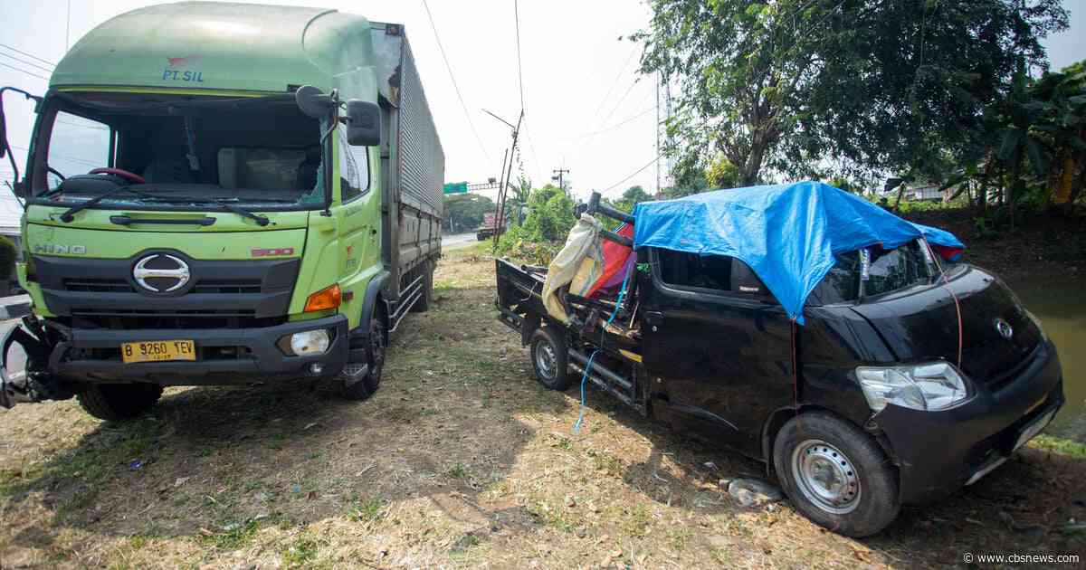 Truck carrying wedding guests hit on Indonesia highway, killing 13, police say