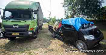 Truck carrying wedding guests hit on Indonesia highway, killing 13, police say