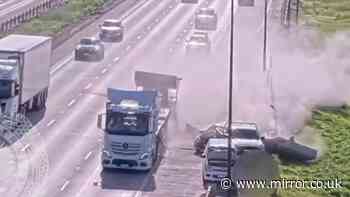 Horror moment concrete slabs fly off lorry and smash into cars on motorway