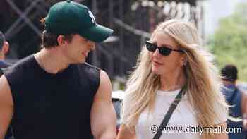 Ellie Goulding, 39, steps out with boyfriend Beau Minniear, 29, and baby daughter Iris in New York after surprise performance at England World Cup match in Miami