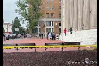 Witness: Heard 8 shots outside Wilson courthouse