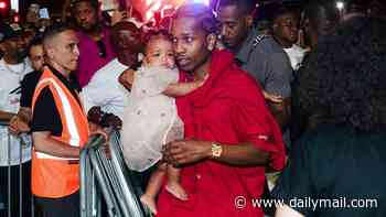 Rihanna's partner A$AP Rocky brings her mini-me daughter Rocki to see her perform at Jay-Z's midnight concert