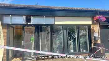 Restaurant front left shattered after car ploughs into building in Rochdale