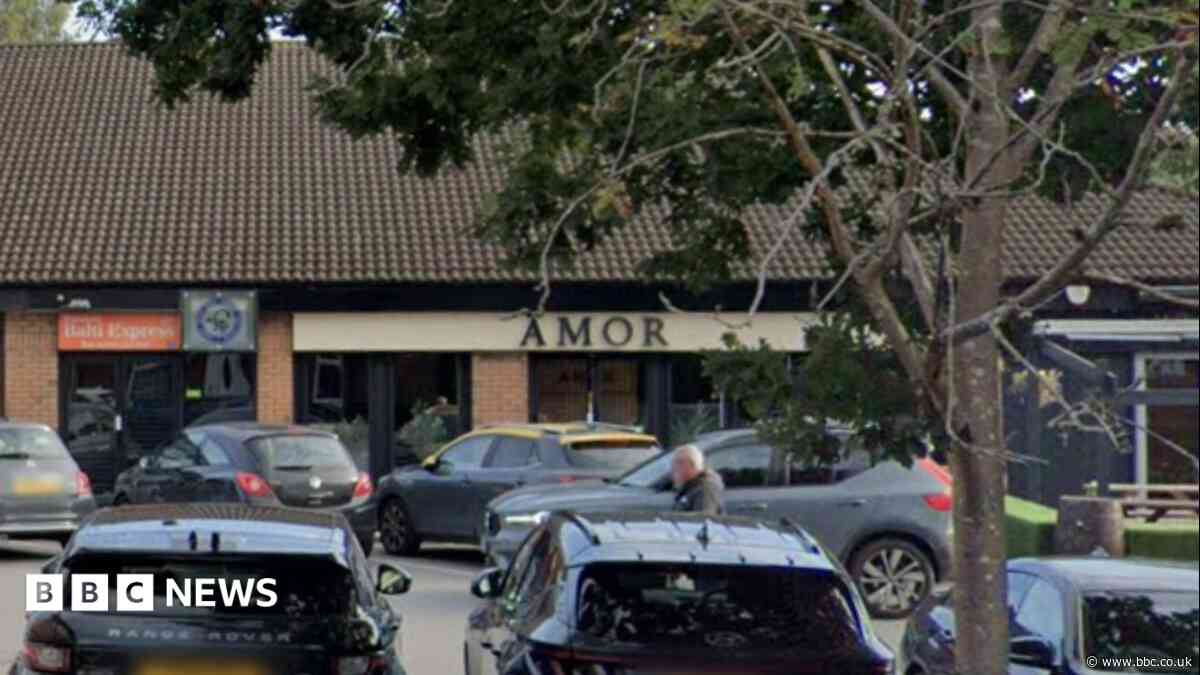 Car crashes into windows of restaurant