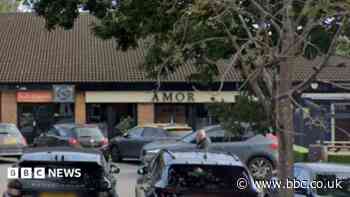 Car crashes into windows of restaurant