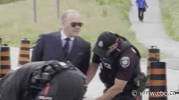 Swiss man who punched anti-war protester in Canada a no-show in Ottawa court