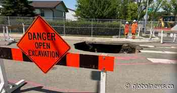 Deep sinkhole opens up in north Edmonton after weekend thunderstorms