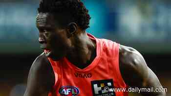 AFL star is blasted for making sexualised gesture to fan in moment caught on TV