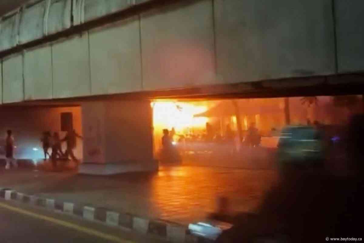 Death toll from a Bangkok music bar fire rises to 30, dozens remain in hospital