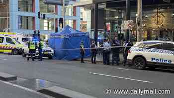 Horror as man dies after plunging off a building in Sydney's CBD