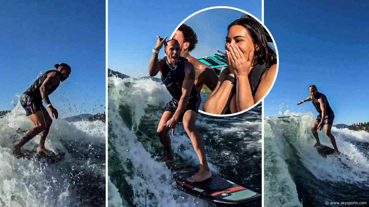 Hamilton shows off impressive surfing skills as Kim K gets HYPED!
