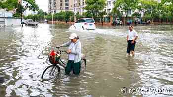Millions evacuated in China as severe flooding traps villagers and sweeps cars away