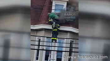 Video: Firefighter rescues man from 5-alarm Mass. fire