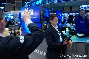 Wall Street calms, and stocks hold steadier after US inflation data comes in less bad than expected