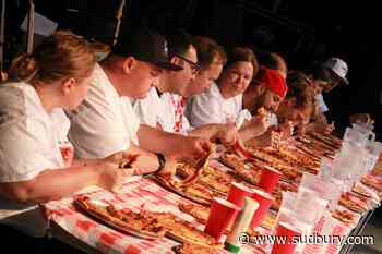 Local celebrities battle it out in pizza eating contest July 15
