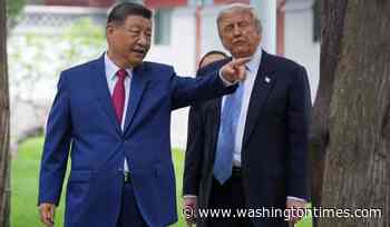 U.S. scientist held in China for nearly 2 years, family reveals, in a case Trump has raised with Xi