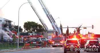 1 person dead after vehicle hits Edmonton apartment building, causing massive fire