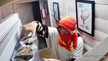 Moment masked thief steals from 24-hour cake shed before brazenly swearing at CCTV