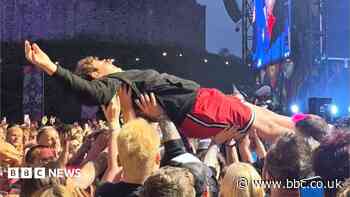 Son of rock band frontman 'fine' after falling on his head during Cardiff crowd surf