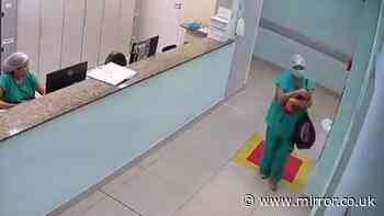 Shocking moment hospital worker who lied about pregnancy 'caught stealing baby' from ward