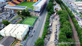 Illegal 7,500-tonne waste dump is found next to football stadium after locals noticed smell of rotting food during heatwave