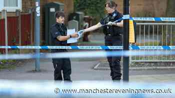 Man and boy, 17, charged after two seriously injured in attack at Hulme traffic lights
