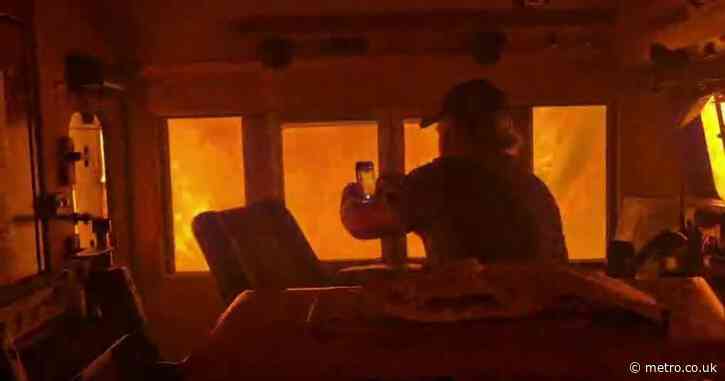 Terrifying footage shows the inside of a train being engulfed by a wildfire