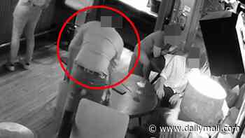 Jury is shown CCTV of Tory MP Patrick Spencer in Groucho club bar as he is accused of 'groping breasts of two women'