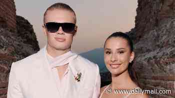 Erling Haaland transforms from footballer to fashionista as he and girlfriend Isabel Haugseng Johansen mingle with the A-list at Dolce & Gabbana show in Sicily after World Cup disappointment