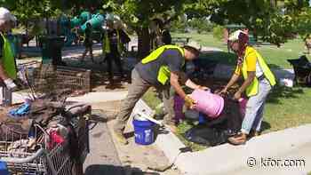 Community cleanup event marks two years to Olympics