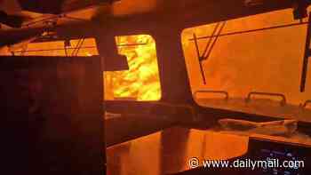 Terrifying video shows men stuck inside train as savage Canada wildfire closes in