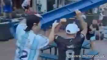 Argentina fans caught throwing bottles and benches at EACH OTHER ahead of 'high risk' England World Cup clash