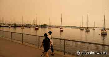 Toronto’s skies turn orange as wildfire smoke settles in