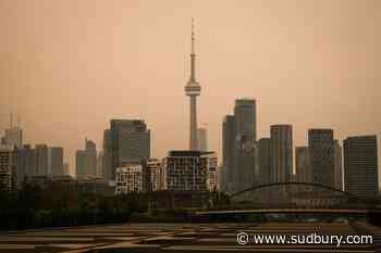 'Apocalypse now?' Wildfire smoke turns Toronto sky orange, prompts air quality alerts