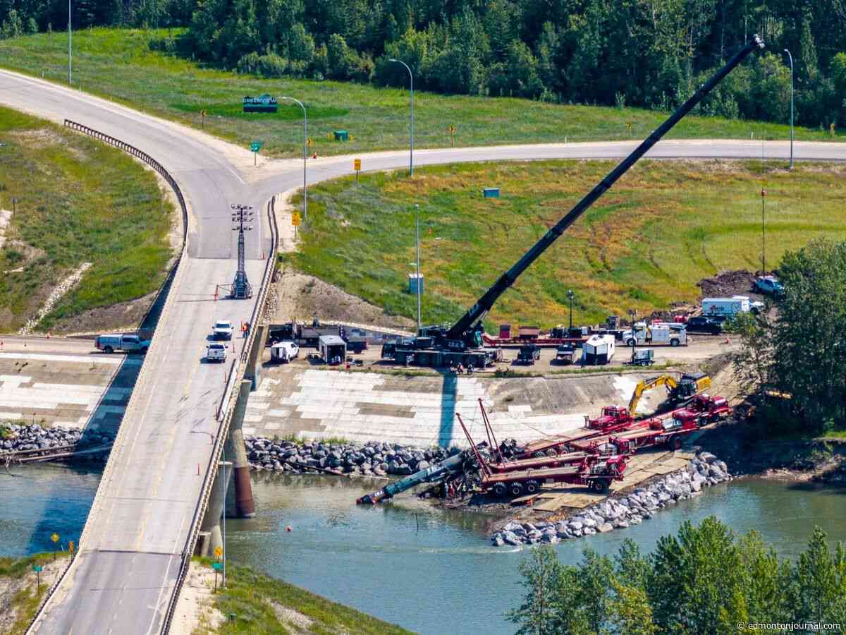 Body of crane driver recovered from northern Alberta river a month after crash