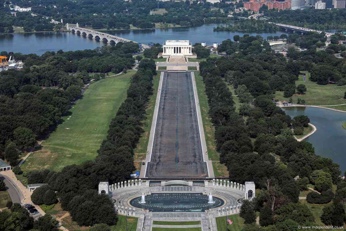 Drained Reflecting Pool reveals Trump's 'American flag blue' liner is now closer to gray