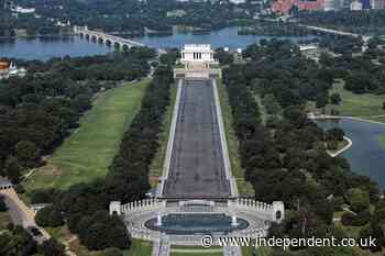 Drained Reflecting Pool reveals Trump's 'American flag blue' liner is now closer to gray