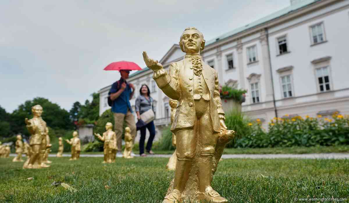 A horde of golden mini-Mozarts marks 270 years since the composer's birth in Salzburg