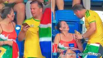 Expert lip reader reveals what really happened between THAT World Cup couple caught on camera... after tense exchange went viral