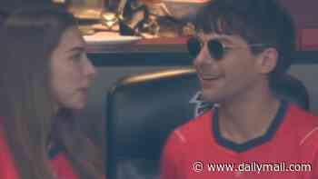 Louis Tomlinson and girlfriend Zara McDermott look loved-up on rare public outing to watch the World Cup