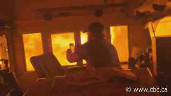CN workers in viral video of train cab surrounded by wildfire flames got out safely, railway says