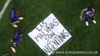 Argentina players wave 'The Falklands belong to us' banner in taunt to England after World Cup exit