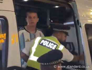 Moment Met Police rescue Argentina fan from crowd in central London