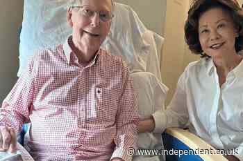 Mitch McConnell’s wife steps out of rehab center in trenchcoat and mask sparking a new round of conspiracies