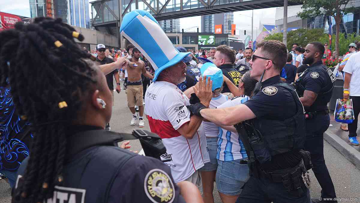 Aggro on the streets: Armed police arrest England and Argentina fans in Atlanta as fans cause chaos in London following Three Lions' loss