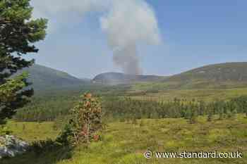 Firefighters work through night tackling wildfire which has led to evacuations