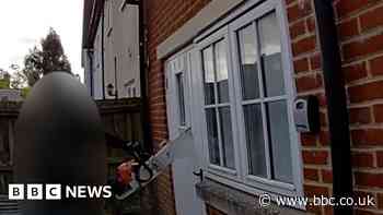 Watch: Police use chainsaw to raid drug dealer's home