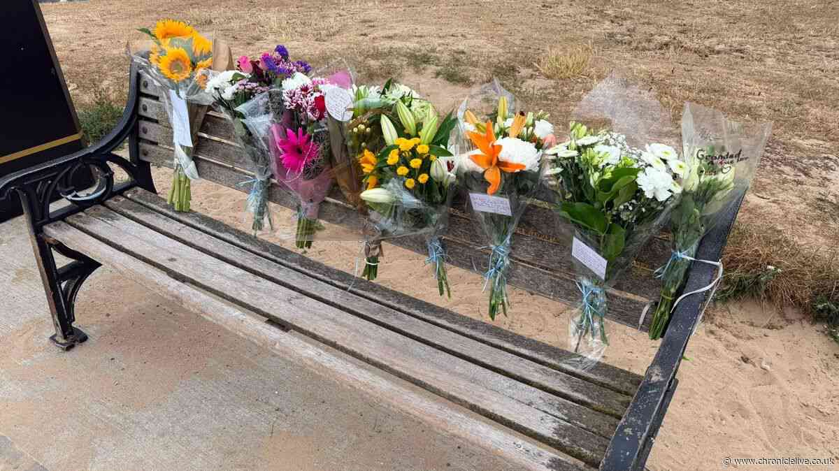 Over £10,000 raised as floral tributes left at scene of double North East sea death tragedy