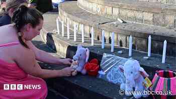 Vigil held after family found dead in house in Ballymena
